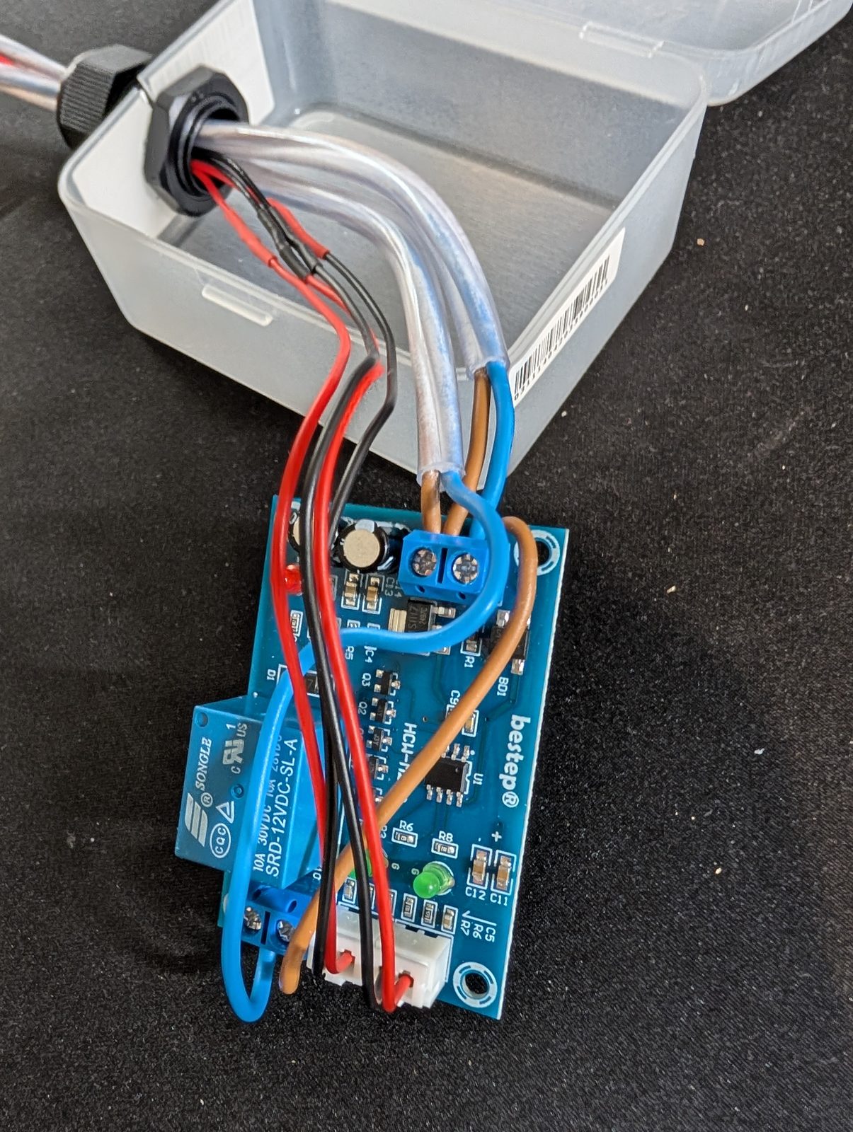 The entire control system. No firmware, no updates, no 3 a.m. reboots. The controller board wired up in its clear box before closing