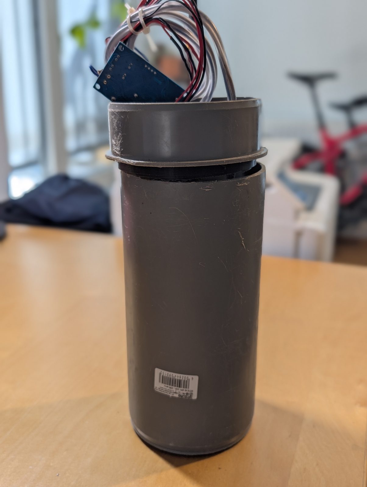 An early HT-pipe prototype. Grey, PP, and structurally committed to leaking. An early grey HT-pipe prototype with the control board loose on top